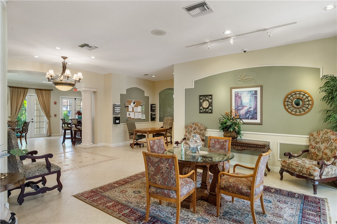 Undisclosed Address Vero Beach, FL 32967 - Photo 28 of 36 a view of a dining room with furniture and a chandelier