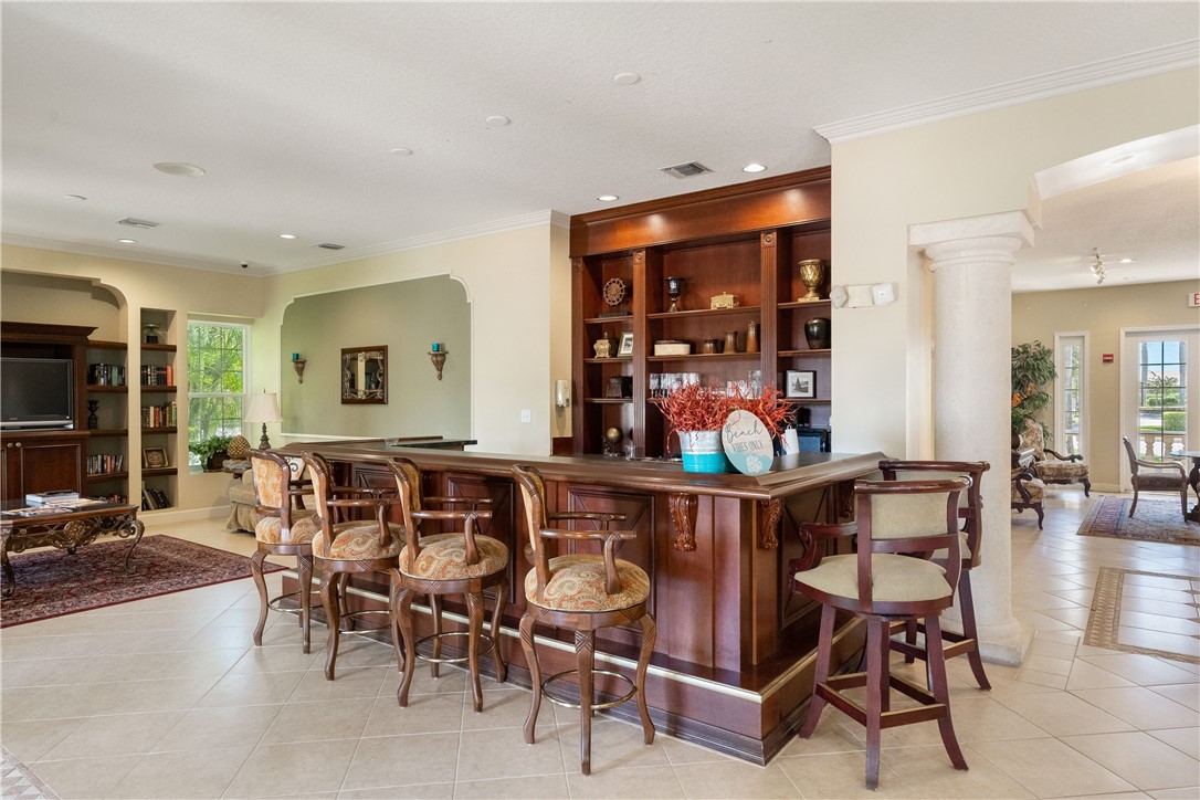 Undisclosed Address Vero Beach, FL 32967 - Photo 30 of 36 a dining room filled with furniture and a window