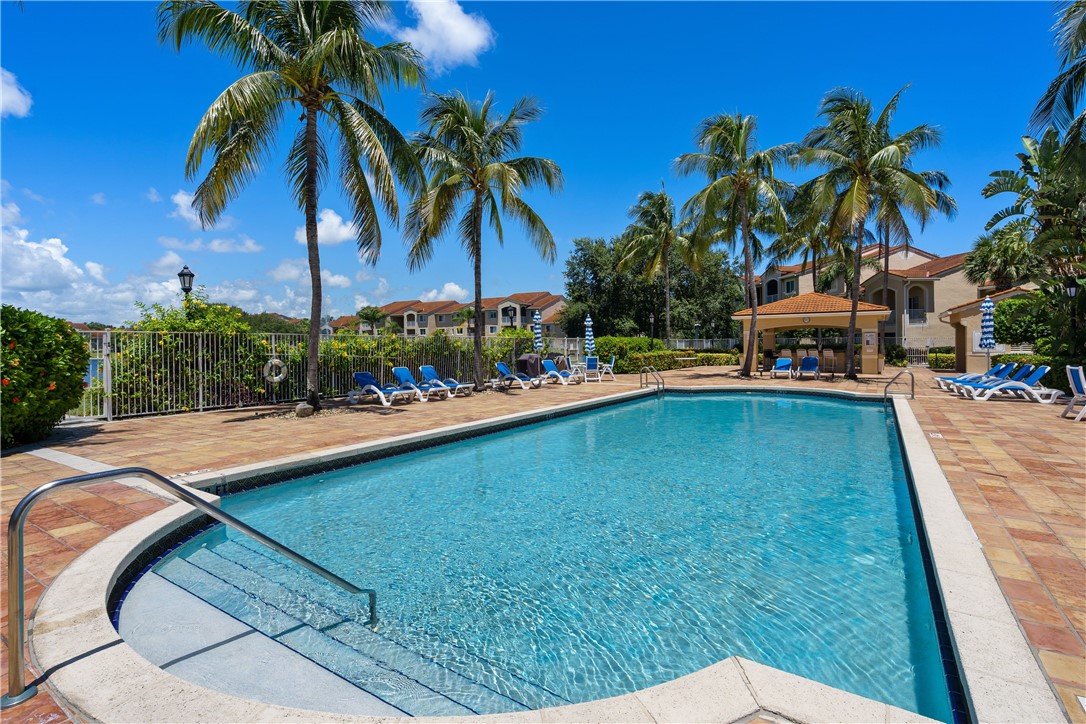 Undisclosed Address Vero Beach, FL 32967 - Photo 32 of 36 a swimming pool with outdoor seating and yard