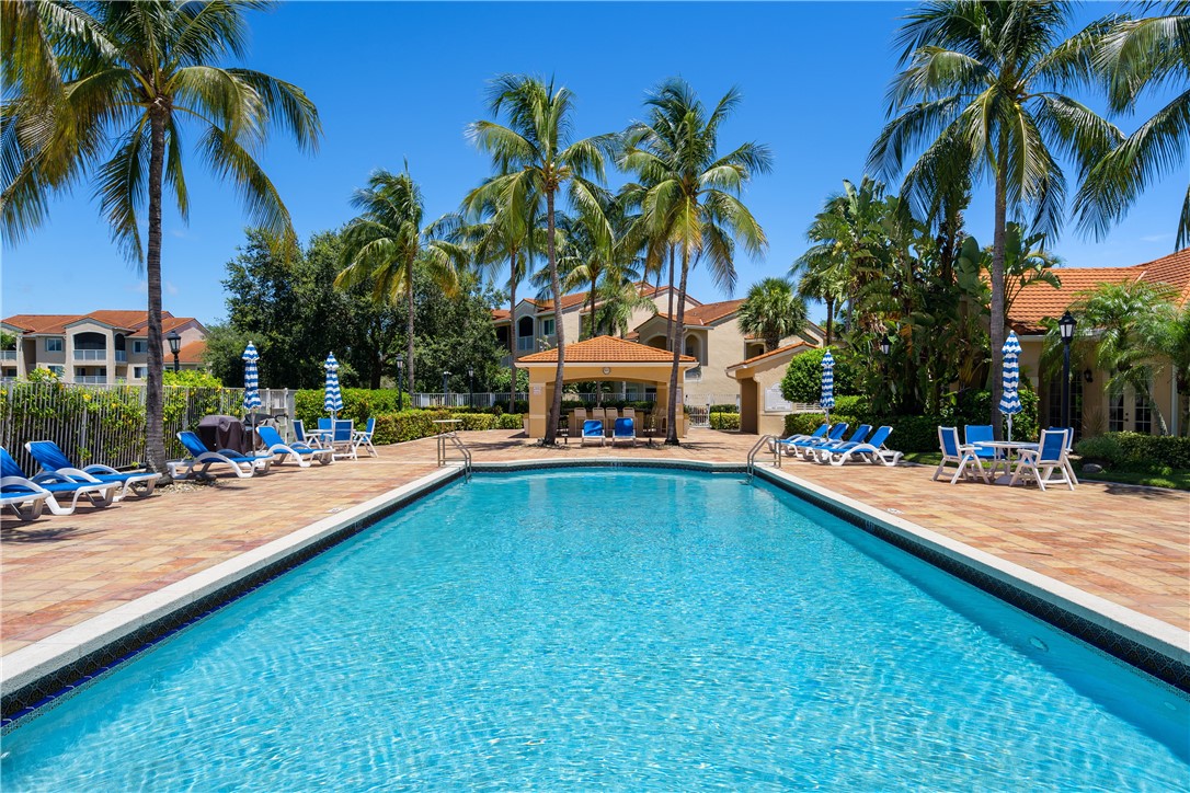 Undisclosed Address Vero Beach, FL 32967 - Photo 36 of 36 a swimming pool with outdoor seating and yard