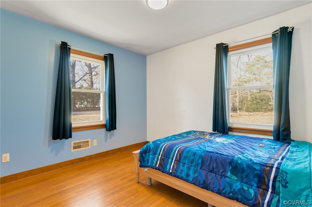3111 Mountclair Road Chester, VA 23831 - Photo 21 of 42 a bedroom with a bed and next to a window