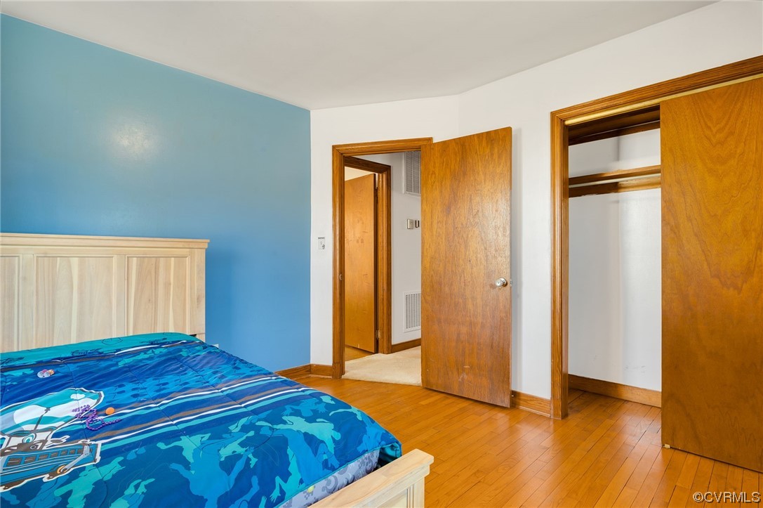 3111 Mountclair Road Chester, VA 23831 - Photo 22 of 42 a bedroom with a bed and a window