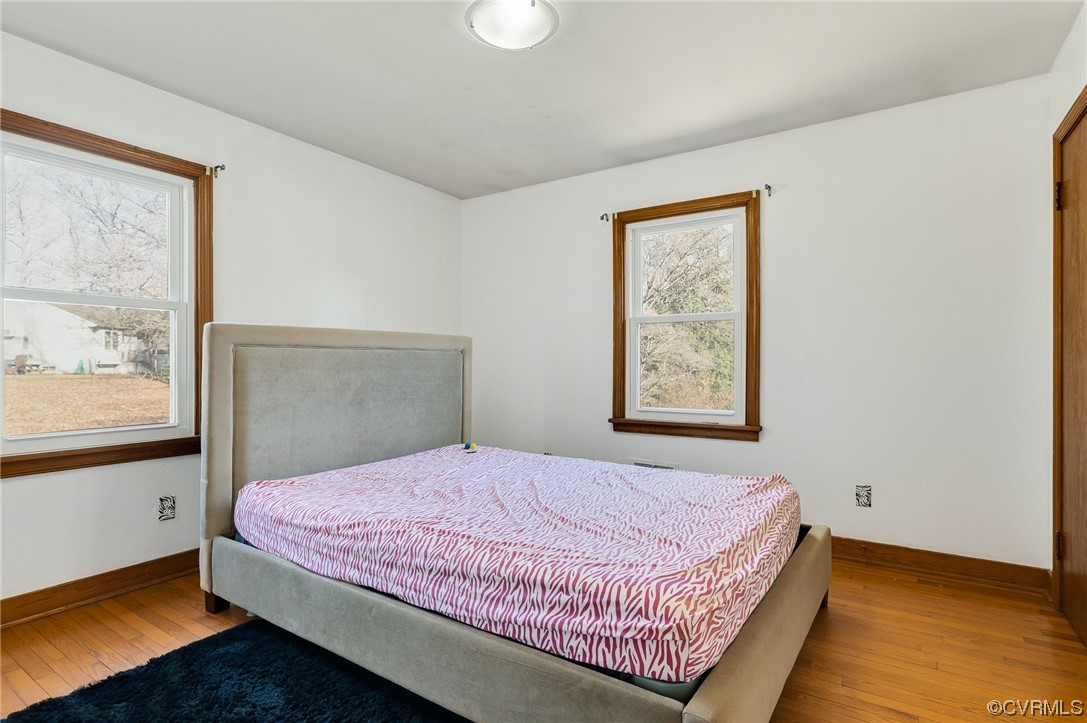 3111 Mountclair Road Chester, VA 23831 - Photo 23 of 42 a bedroom with a bed and window