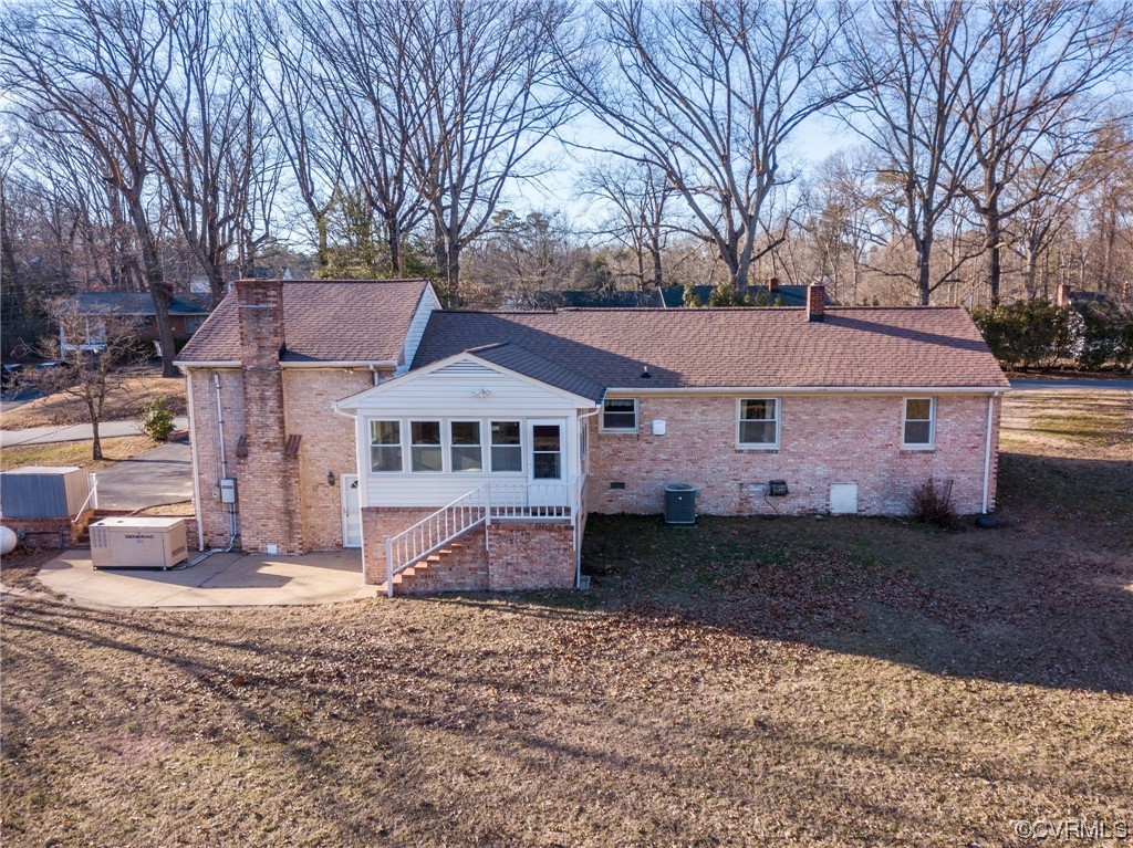 3111 Mountclair Road Chester, VA 23831 - Photo 3 of 42 a front view of a house with a yard