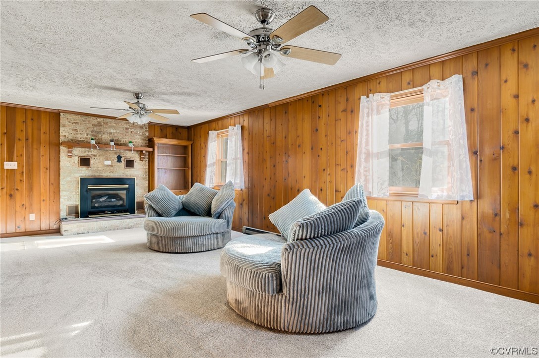 3111 Mountclair Road Chester, VA 23831 - Photo 31 of 42 a living room with furniture and a fireplace