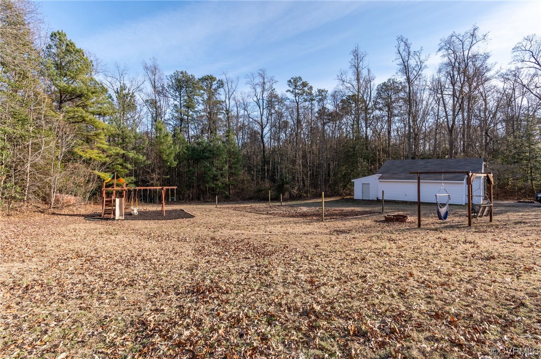 3111 Mountclair Road Chester, VA 23831 - Photo 35 of 42 a backyard of a house with trees