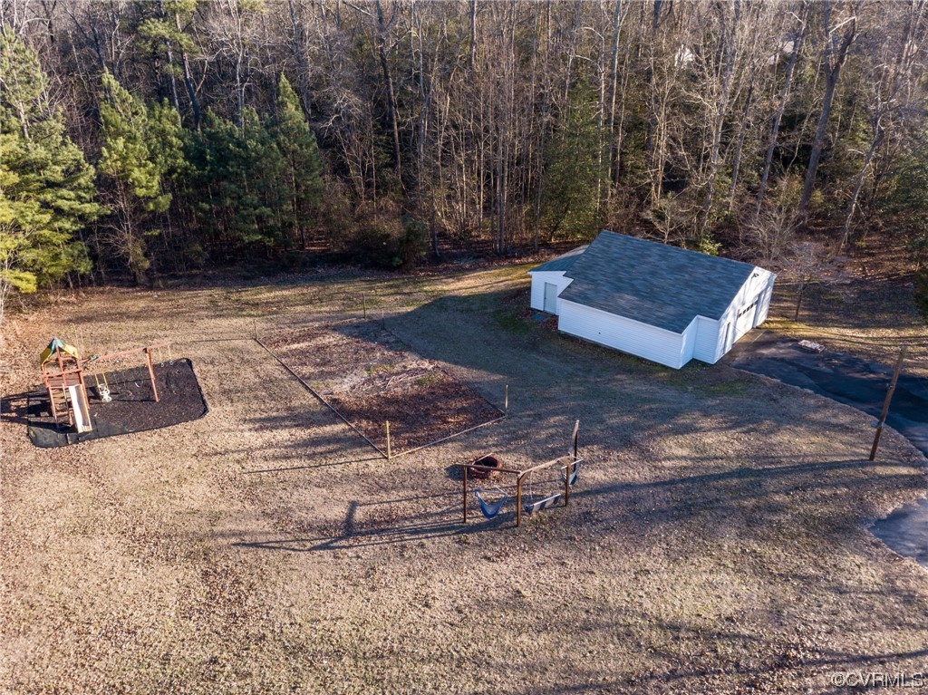 3111 Mountclair Road Chester, VA 23831 - Photo 7 of 42 a view of a backyard with large trees