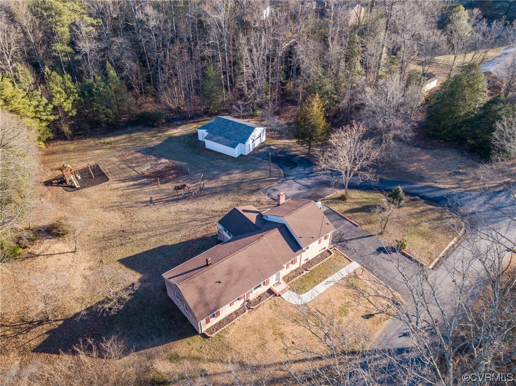 3111 Mountclair Road Chester, VA 23831 - Photo 8 of 42 a view of a backyard with table and chairs