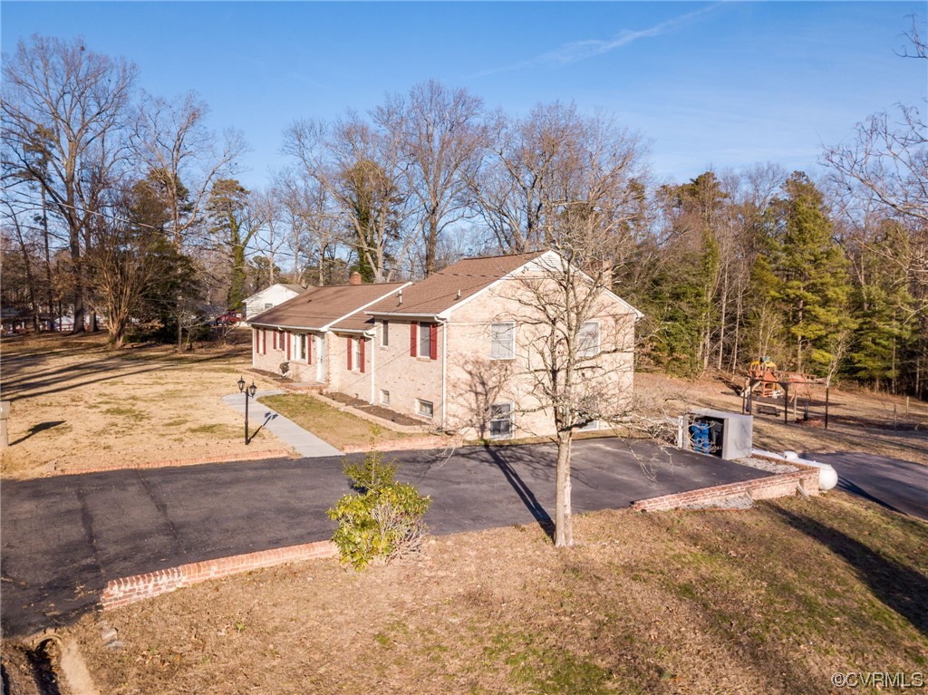 3111 Mountclair Road Chester, VA 23831 - Photo 10 of 42 a view of a swimming pool with a patio