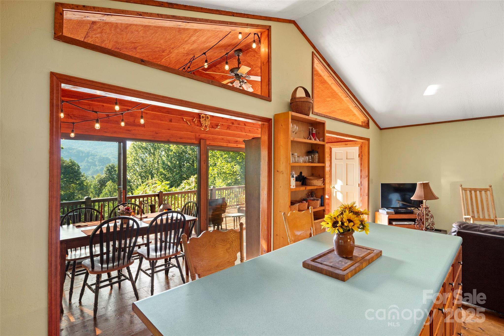 31 Piney Rdg Lane, Unit 27 Saluda, NC 28773 - Photo 13 of 36 a view of a dining room with furniture window and outside view