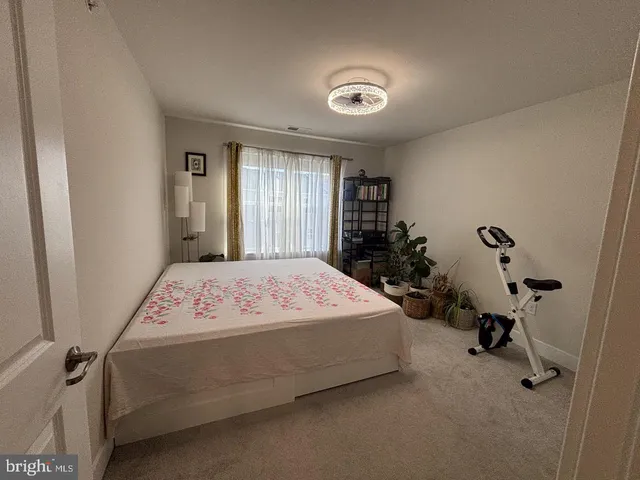 a front view of building with retail shops