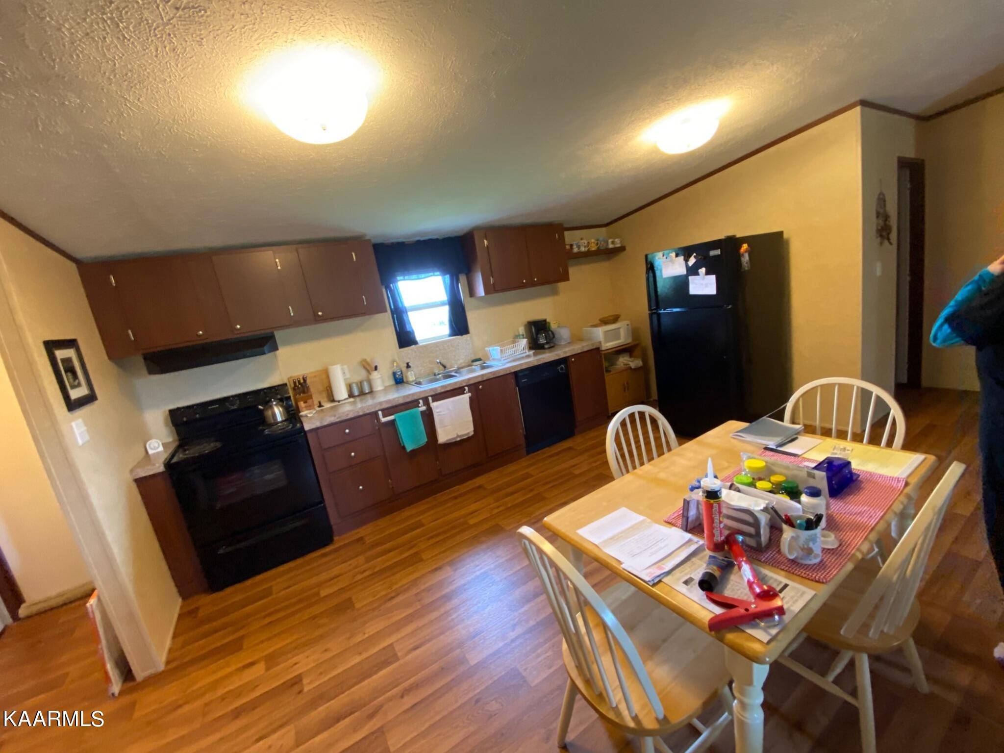 929 Reed Bull Road New Market, TN 37820 - Photo 8 of 11 a view of a dining room with furniture and wooden floor