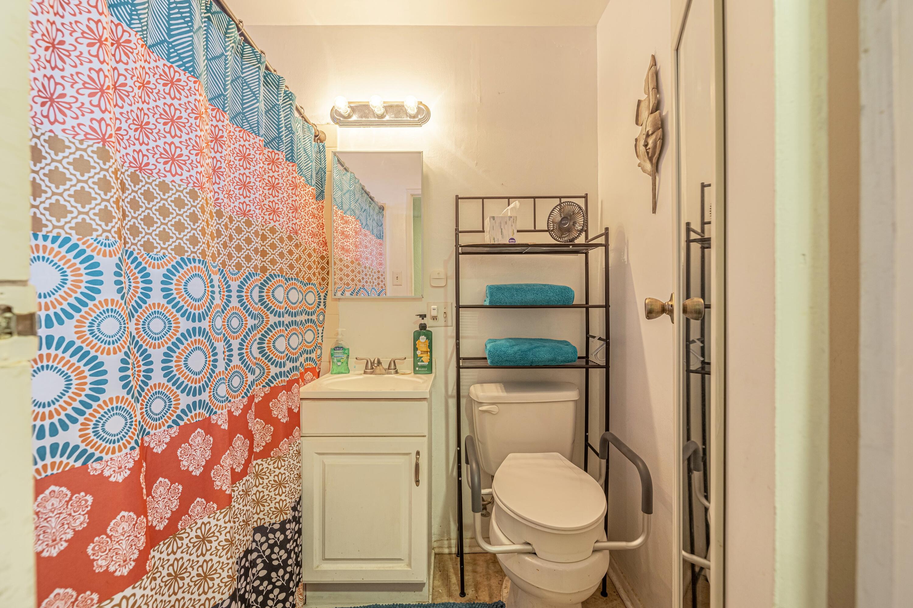5245 West Ave L4 Lancaster, CA 93536 - Photo 19 of 35 a bathroom with a toilet and a sink