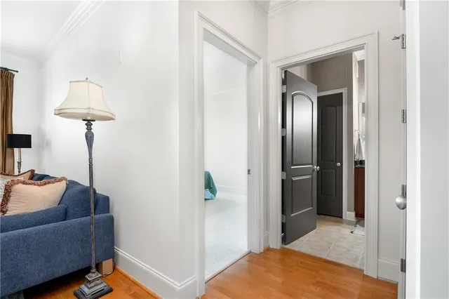 a view of a livingroom with furniture and a bathroom