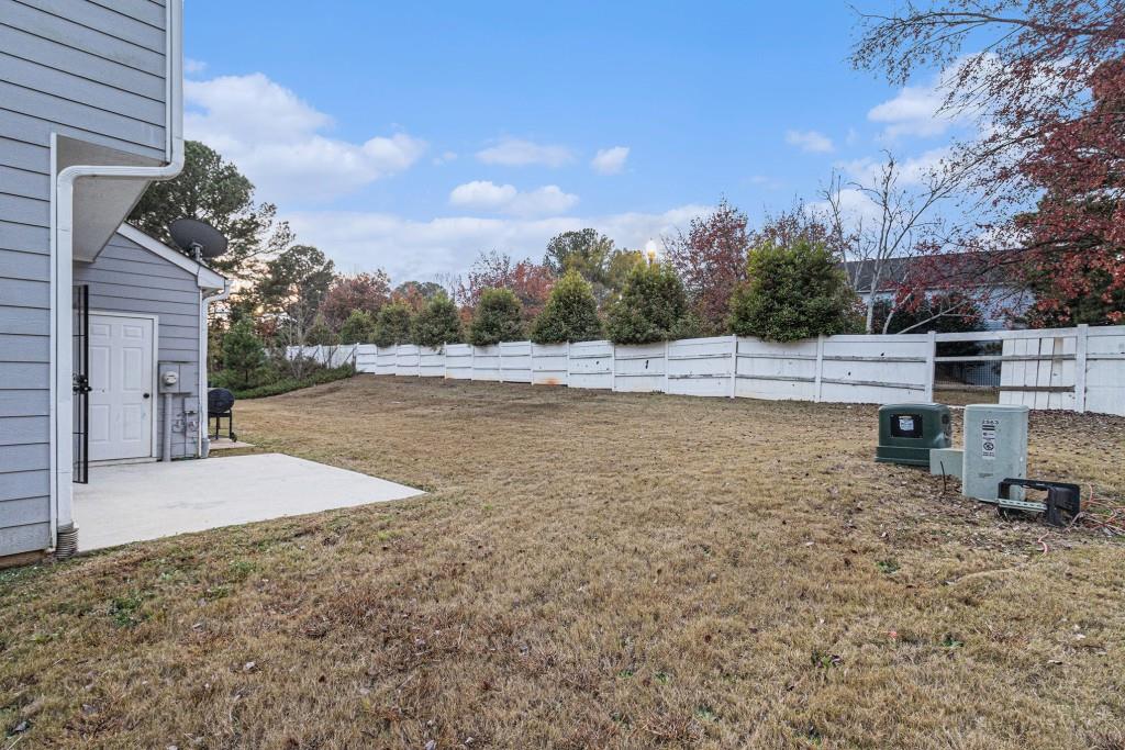 2563 Walden Lake Drive Decatur, GA 30035 - Photo 24 of 27 a view of a swimming pool with an outdoor space and seating area