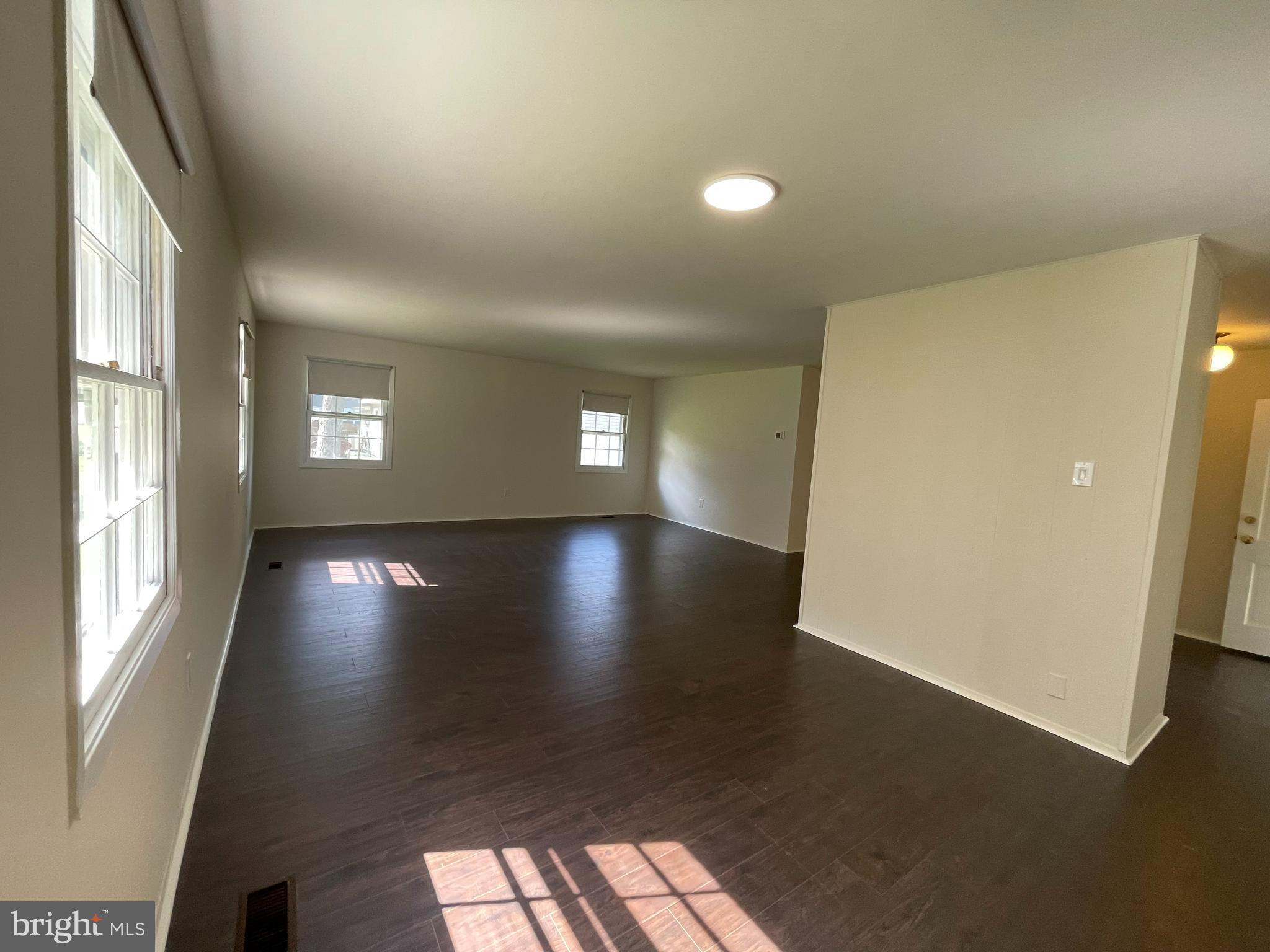 15713 Pointer Ridge Drive Bowie, MD 20716 - Photo 4 of 11 Dining to Living Rm