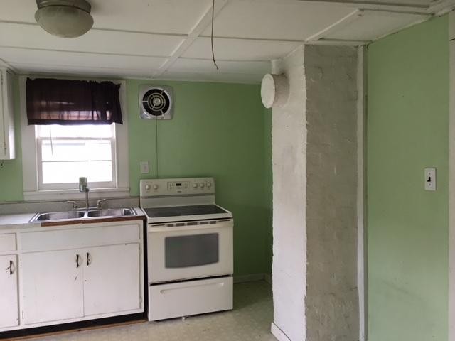 8314 Coppock Road Corryton, TN 37721 - Photo 19 of 29 a kitchen with a stove and a sink