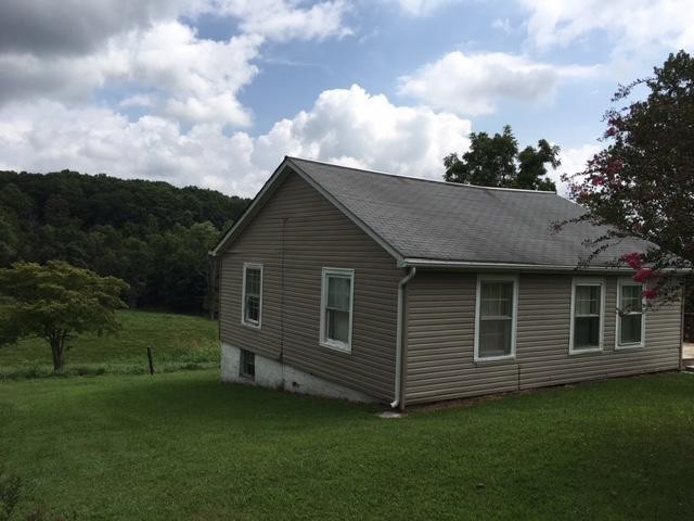 8314 Coppock Road Corryton, TN 37721 - Photo 2 of 29 a view of a house with a backyard