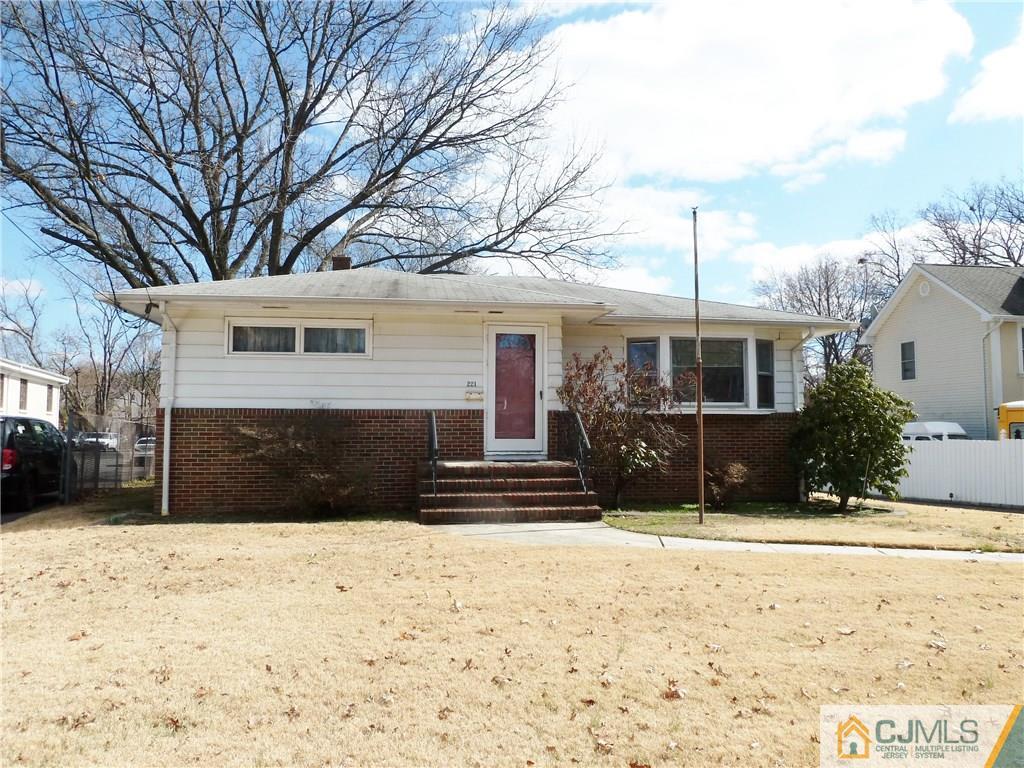 221 Crowells Road Edison, NJ 08817 - Photo 2 of 13 a front view of house with a yard