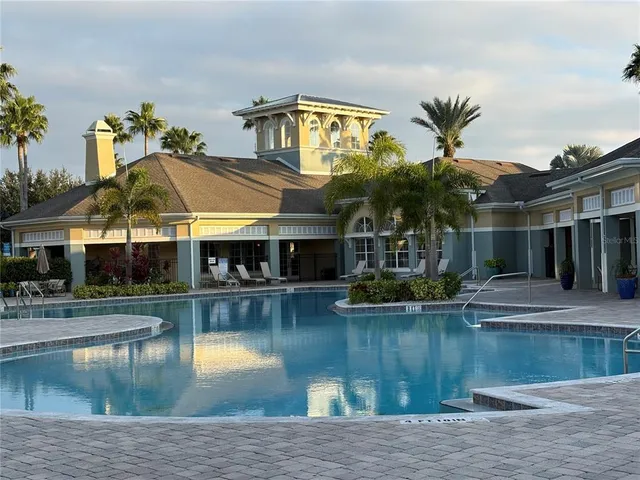 a house with river in front of it