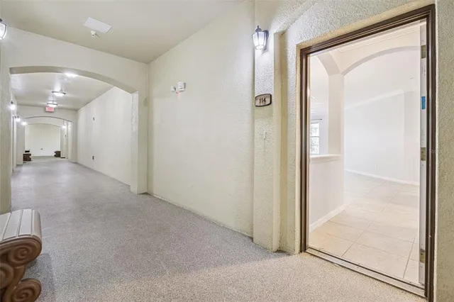 a view of a hallway with closet