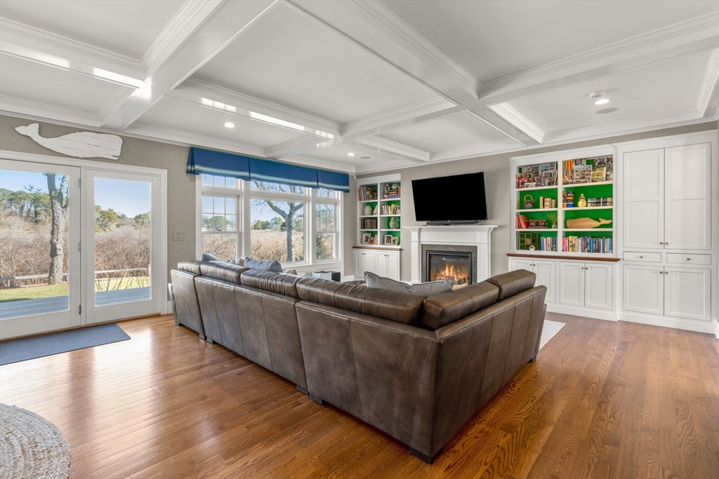 67 Uncle Alberts Drive Chatham, MA 02633 - Photo 12 of 41 a living room with furniture and a flat screen tv