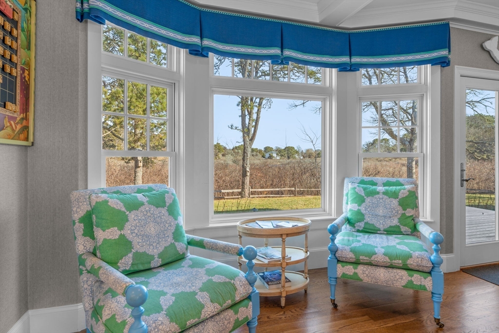 67 Uncle Alberts Drive Chatham, MA 02633 - Photo 19 of 41 a living room filled with furniture and a large window
