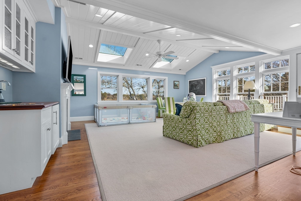 67 Uncle Alberts Drive Chatham, MA 02633 - Photo 28 of 41 a living room with furniture and a wooden floor