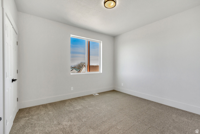 547 North Hvn Drive Mapleton, UT 84664 - Photo 16 of 23 Unfurnished bedroom with light carpet and a closet