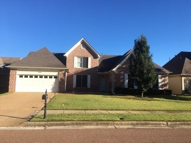 10486 Juneau Way Collierville, TN 38017 - Photo 1 of 33 View of property featuring a front yard and a garage