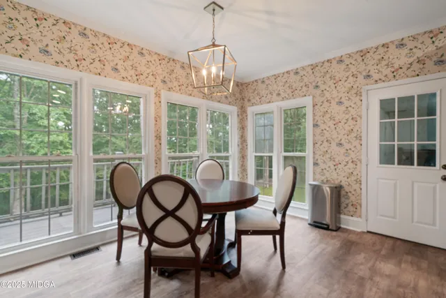 a kitchen with a sink and large window