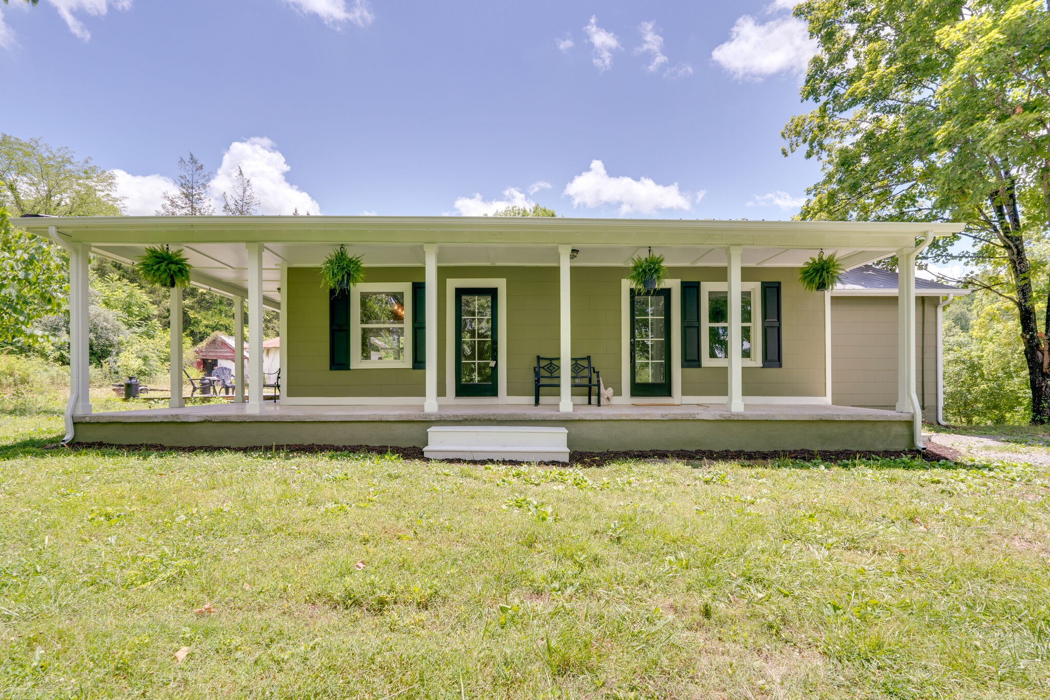 2154 Temperance Hall Road Lancaster, TN 38569 - Photo 3 of 35 a view of a house with a swimming pool and a yard
