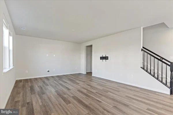 a view of kitchen with wooden floor