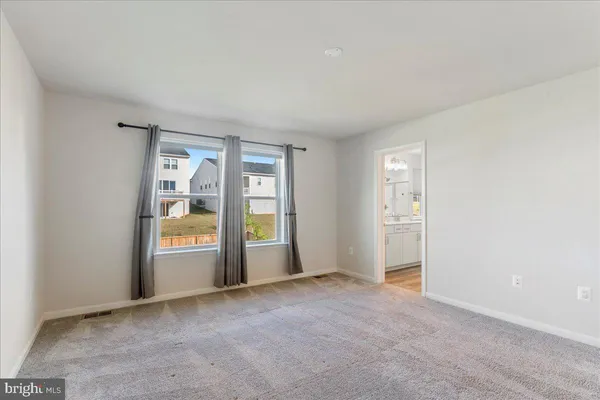 a bathroom with a double vanity sink mirror and double