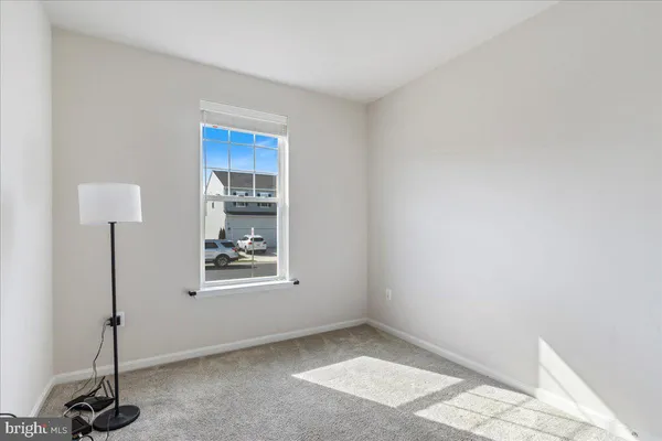 a bathroom with a sink vanity and a mirror