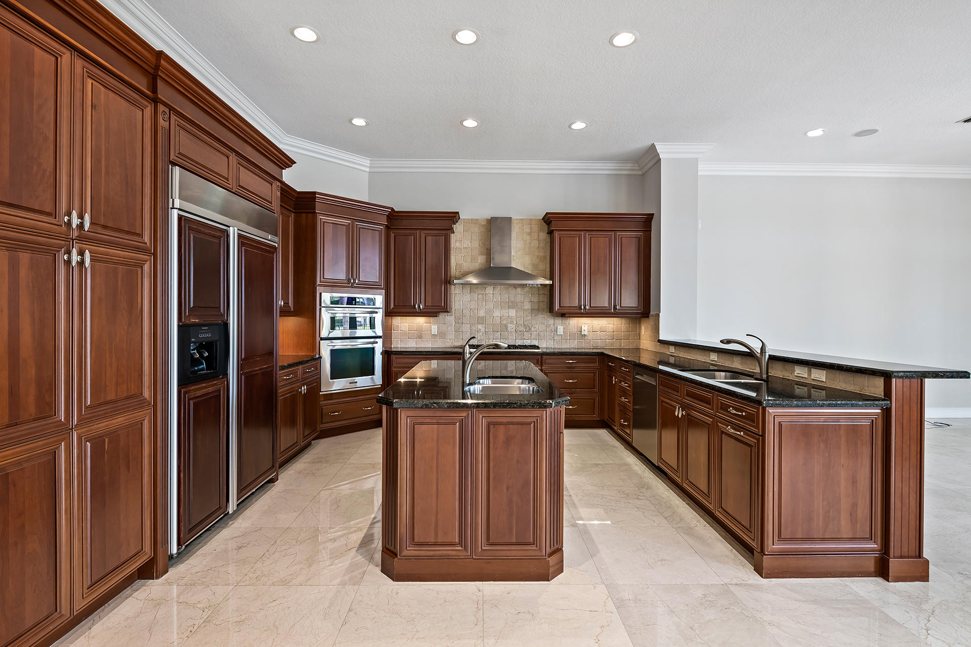 17895 Cadena Drive Boca Raton, FL 33496 - Photo 11 of 64 a kitchen with stainless steel appliances granite countertop a stove refrigerator and a sink