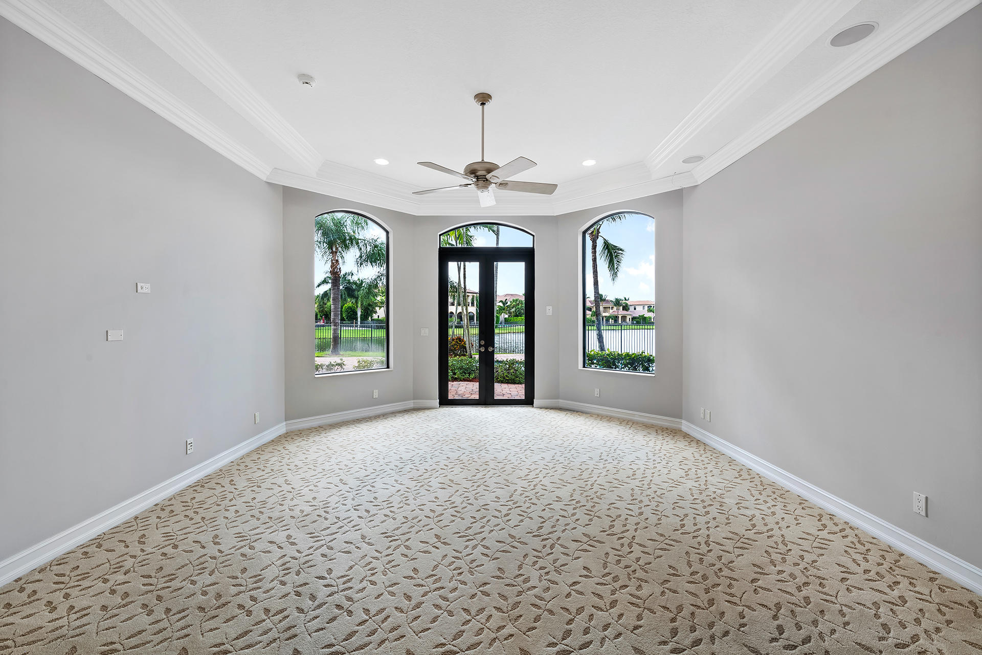 17895 Cadena Drive Boca Raton, FL 33496 - Photo 20 of 64 a view of an empty room with window and ceiling fan