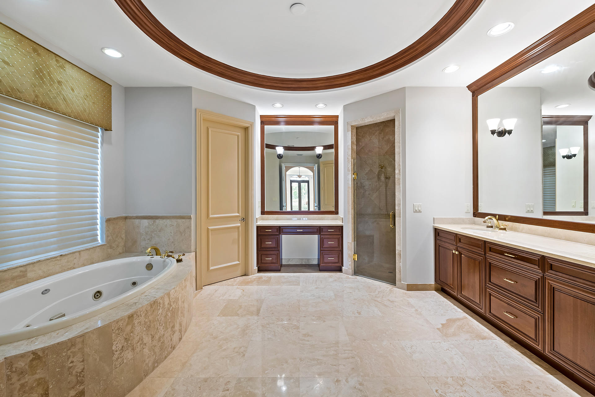 17895 Cadena Drive Boca Raton, FL 33496 - Photo 27 of 64 a spacious bathroom with a tub sink and mirror