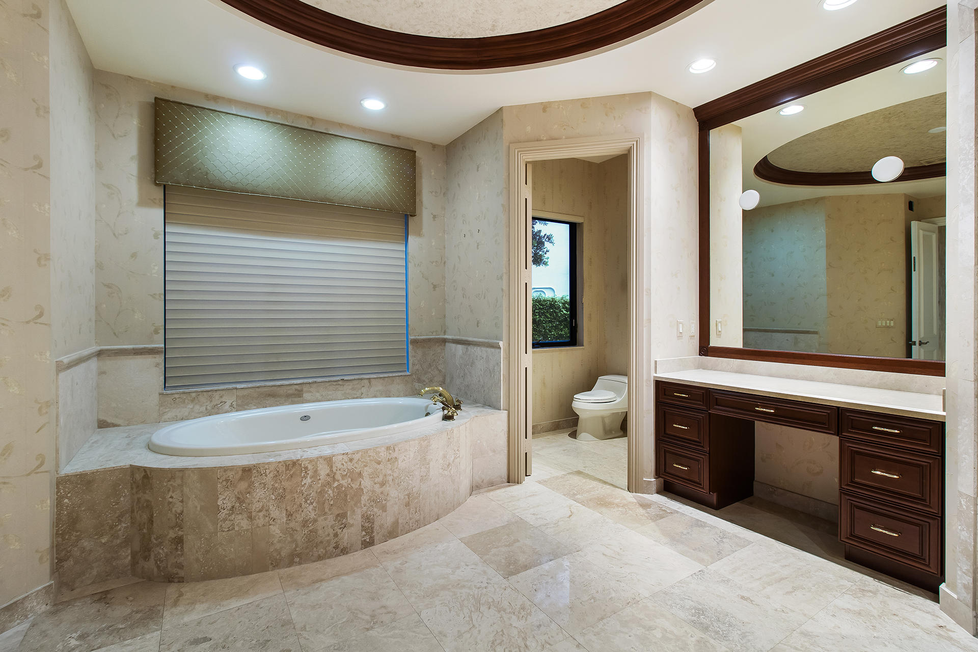17895 Cadena Drive Boca Raton, FL 33496 - Photo 28 of 64 a bathroom with a tub sink and mirror