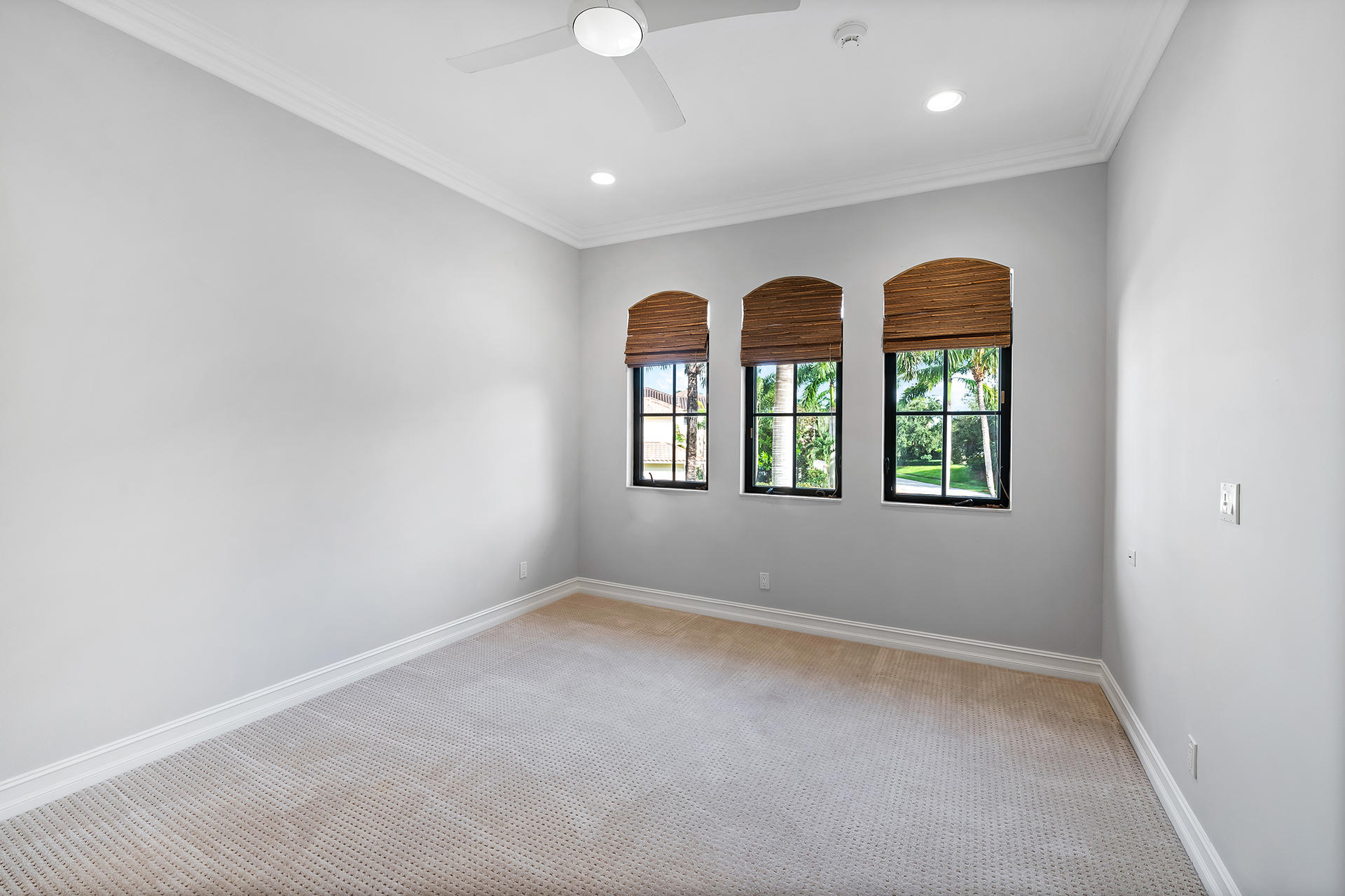17895 Cadena Drive Boca Raton, FL 33496 - Photo 39 of 64 an empty room with windows and closet