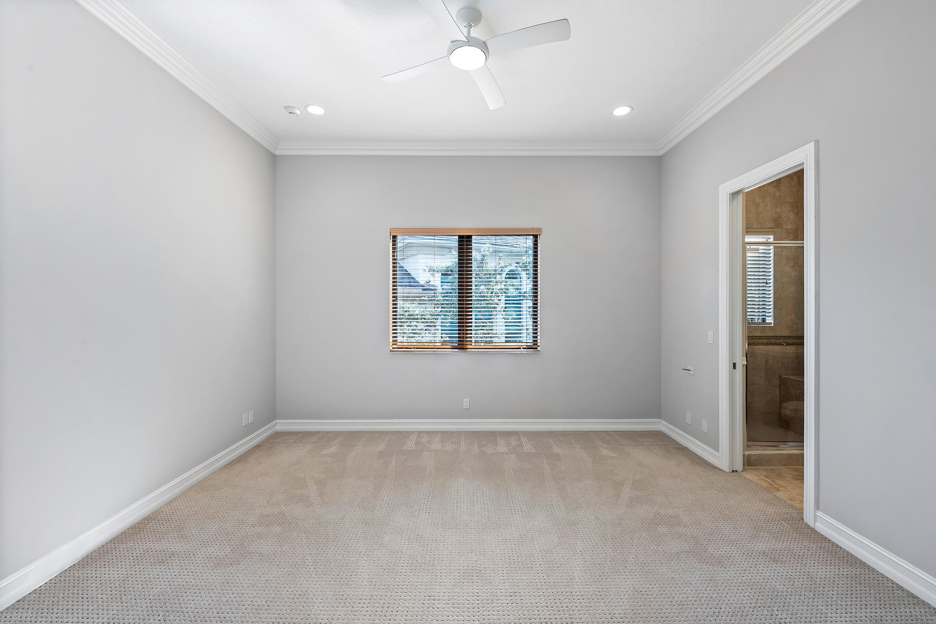 17895 Cadena Drive Boca Raton, FL 33496 - Photo 44 of 64 an empty room with windows