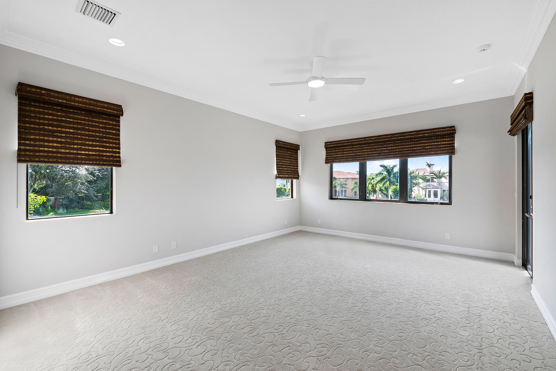 17895 Cadena Drive Boca Raton, FL 33496 - Photo 49 of 64 an empty room with windows