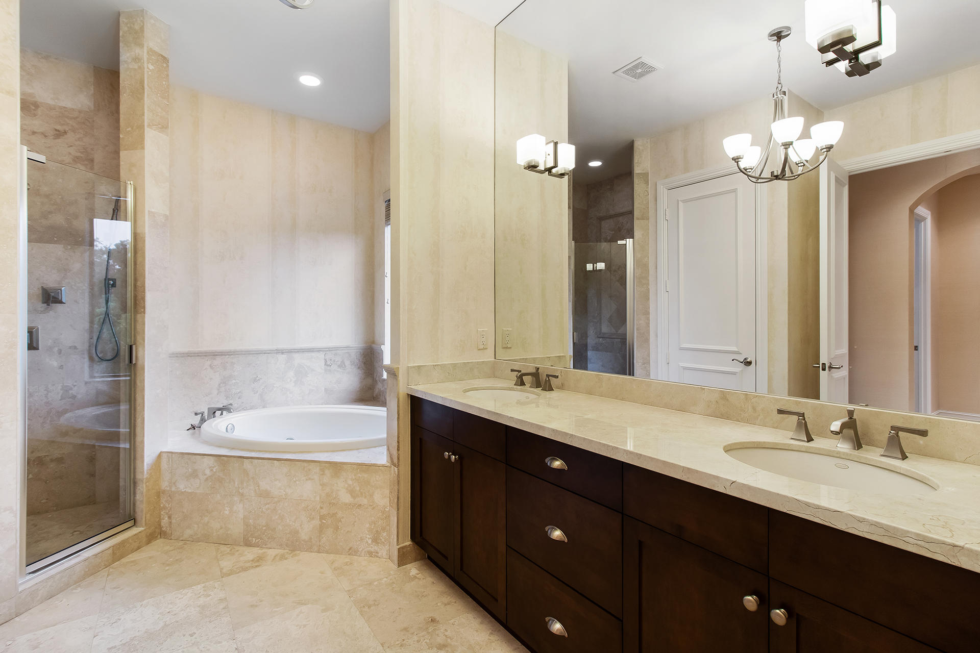 17895 Cadena Drive Boca Raton, FL 33496 - Photo 52 of 64 a bathroom with a granite countertop bathtub a double vanity sink and a shower