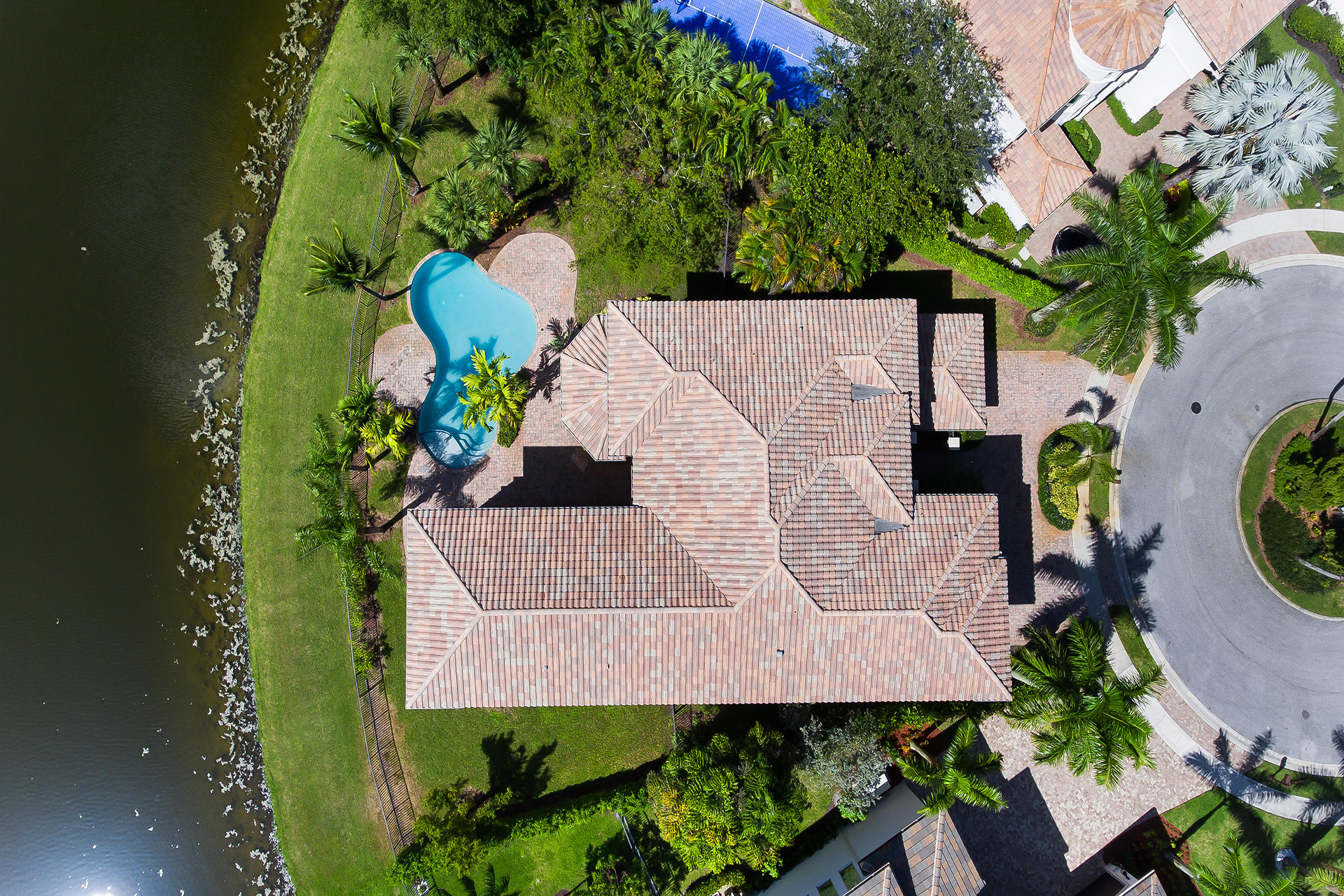 17895 Cadena Drive Boca Raton, FL 33496 - Photo 59 of 64 an aerial view of a house with a yard and lake view