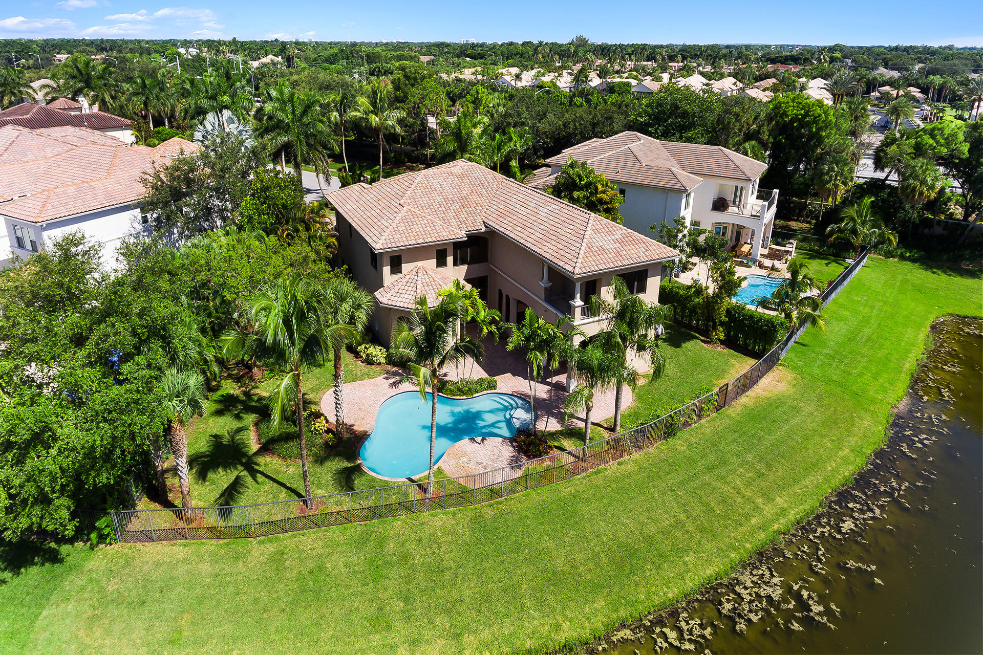 17895 Cadena Drive Boca Raton, FL 33496 - Photo 63 of 64 a aerial view of a house with swimming pool garden and outdoor seating