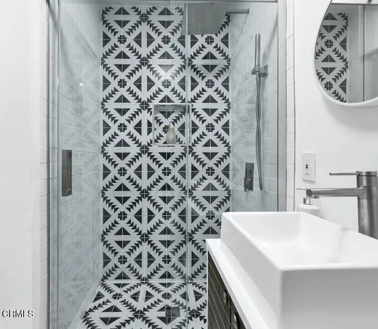 a close view of sink and cabinets