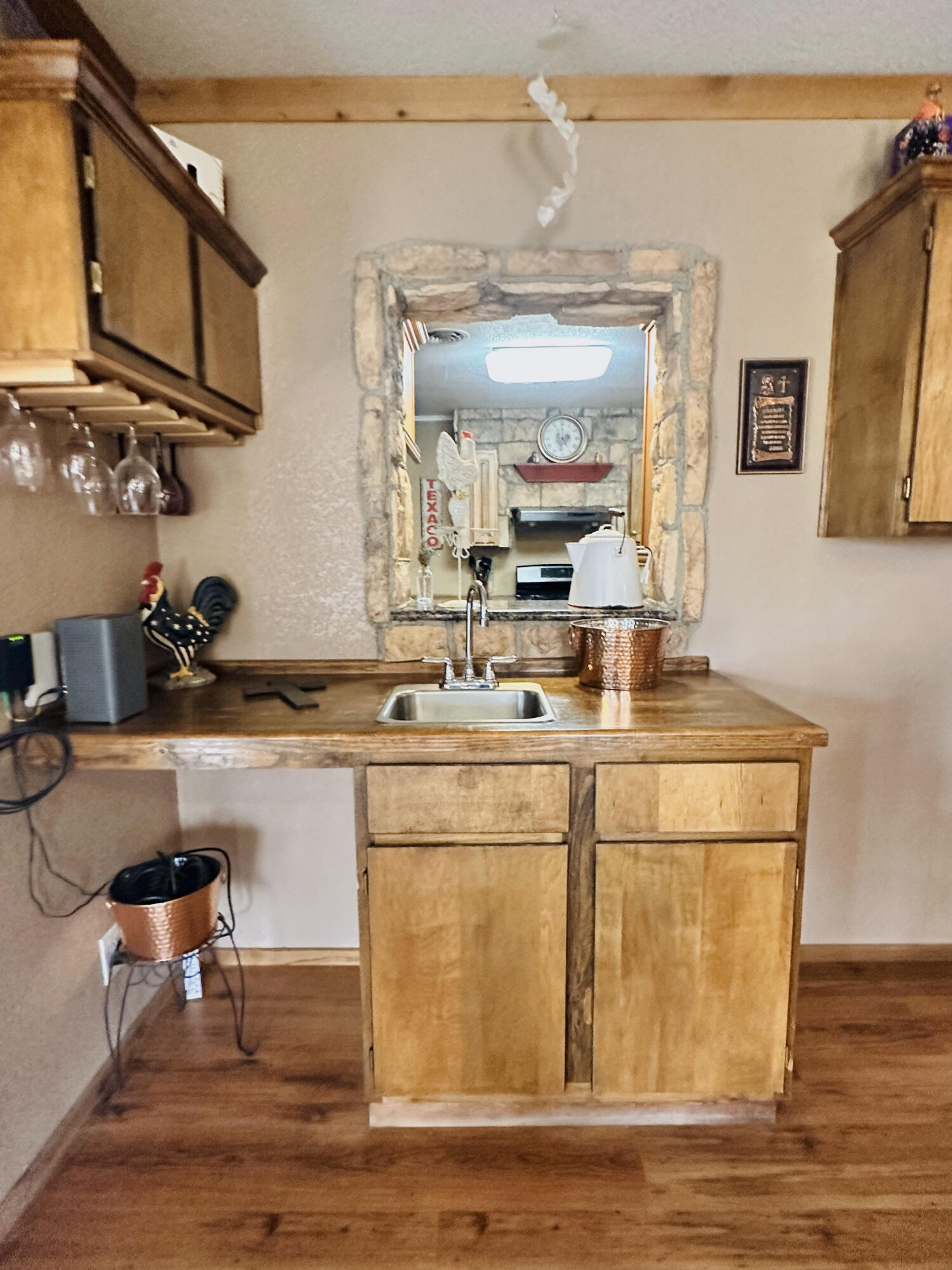 403 Osage Avenue Post, TX 79356 - Photo 15 of 31 a room with stainless steel appliances kitchen island granite countertop wooden floor and view living room