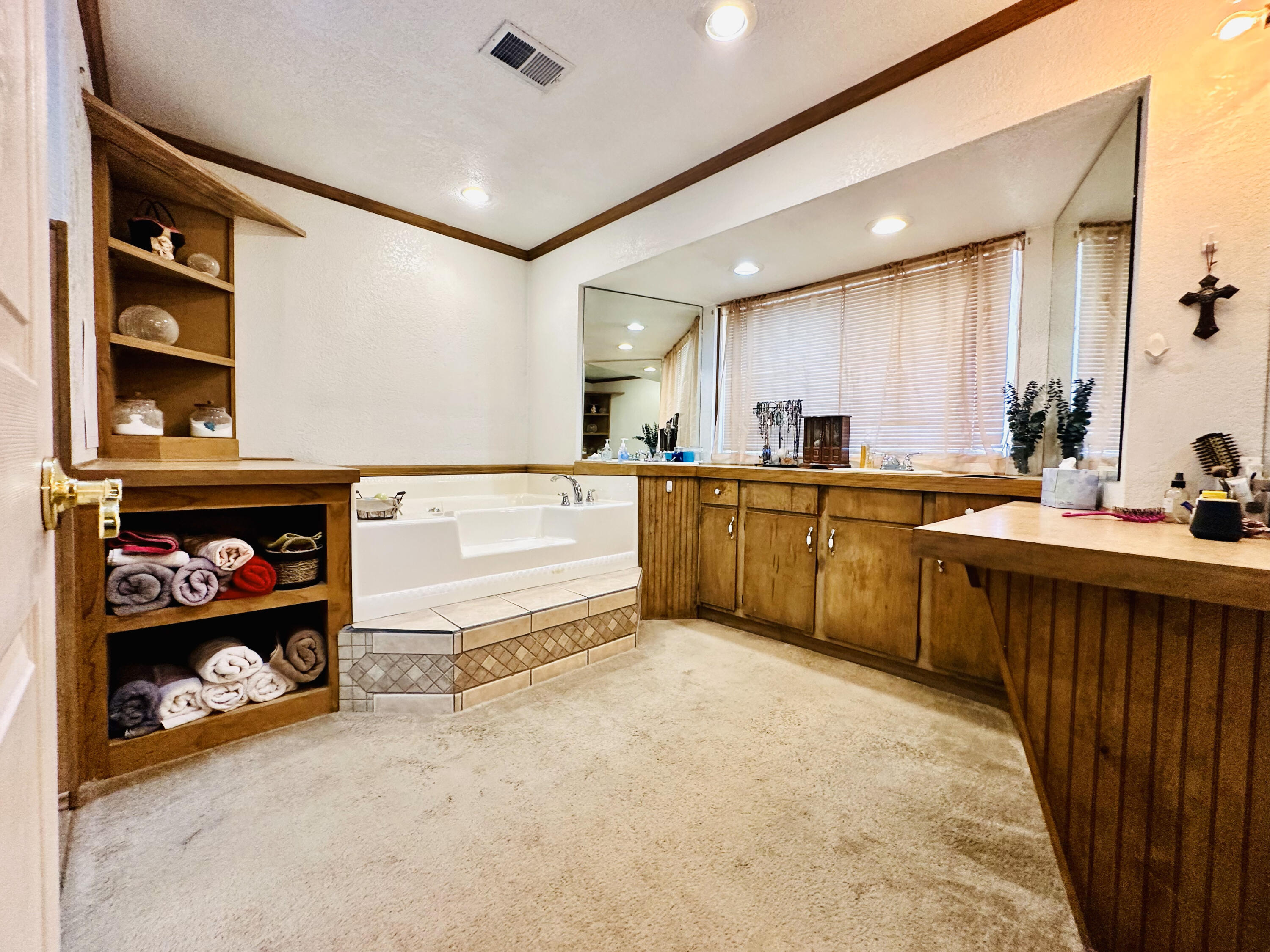 403 Osage Avenue Post, TX 79356 - Photo 17 of 31 a large kitchen with stainless steel appliances granite countertop a sink and cabinets