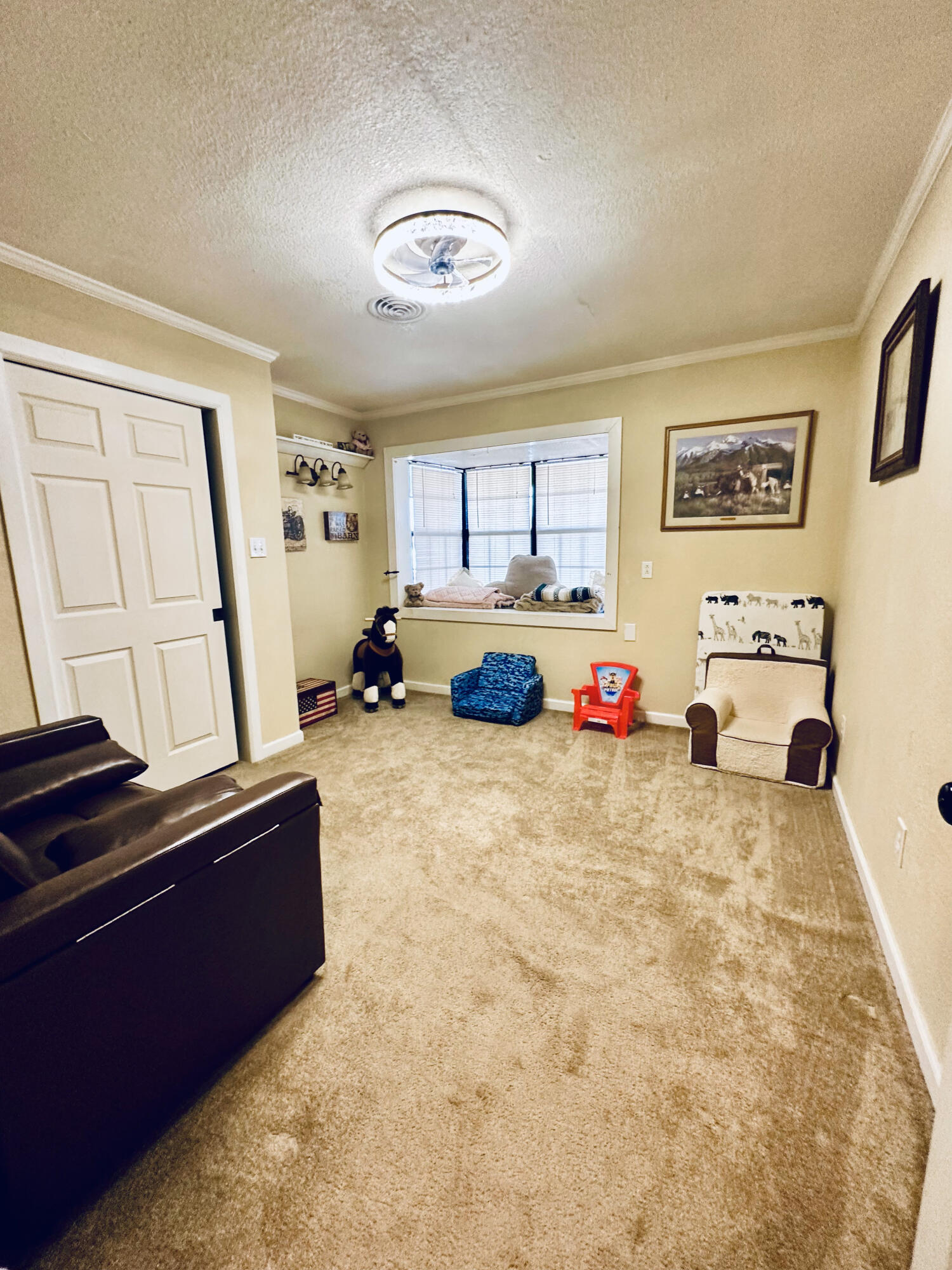 403 Osage Avenue Post, TX 79356 - Photo 23 of 31 a bed room with furniture and a window