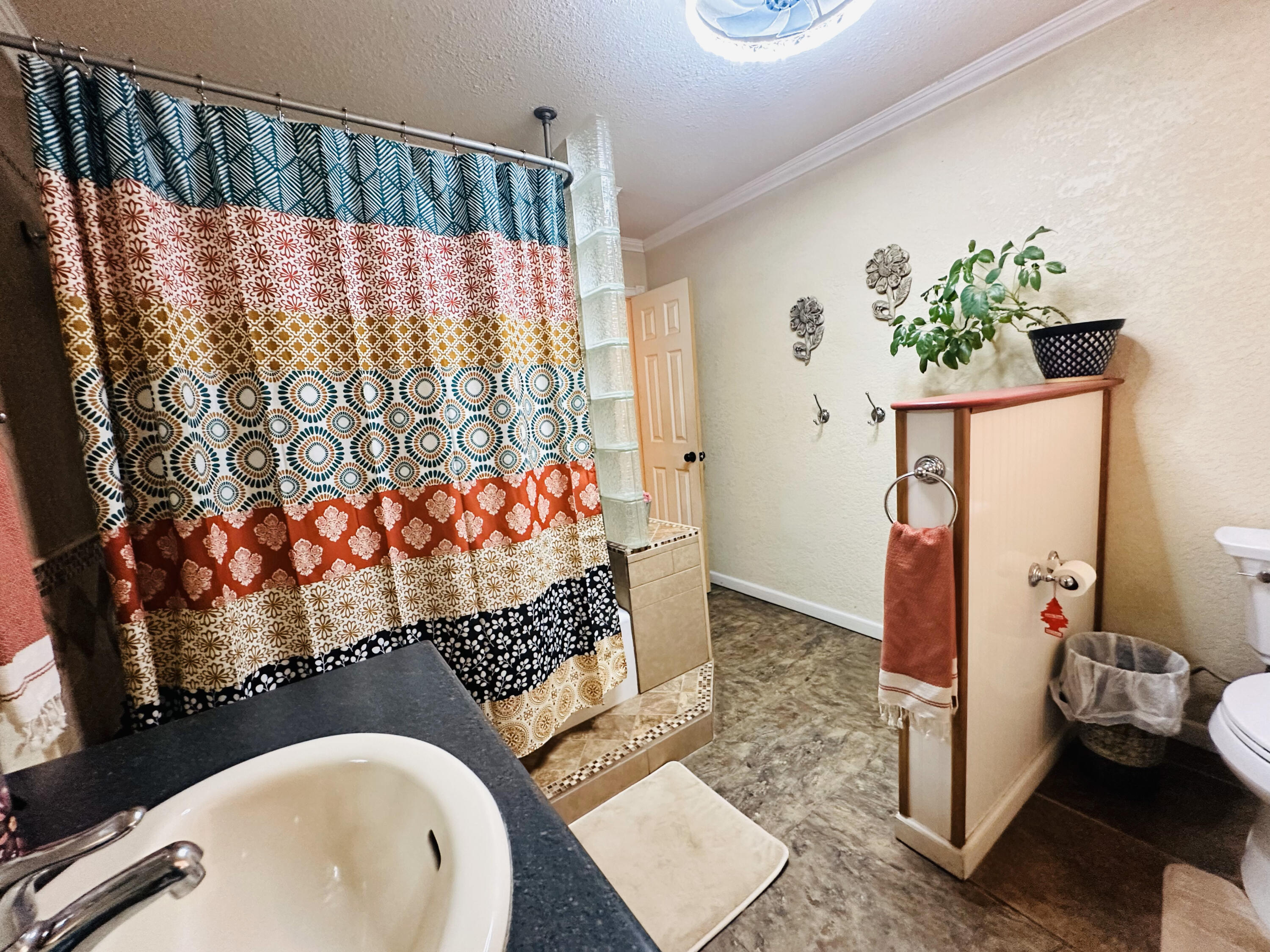 403 Osage Avenue Post, TX 79356 - Photo 26 of 31 a bathroom with a sink toilet and shower